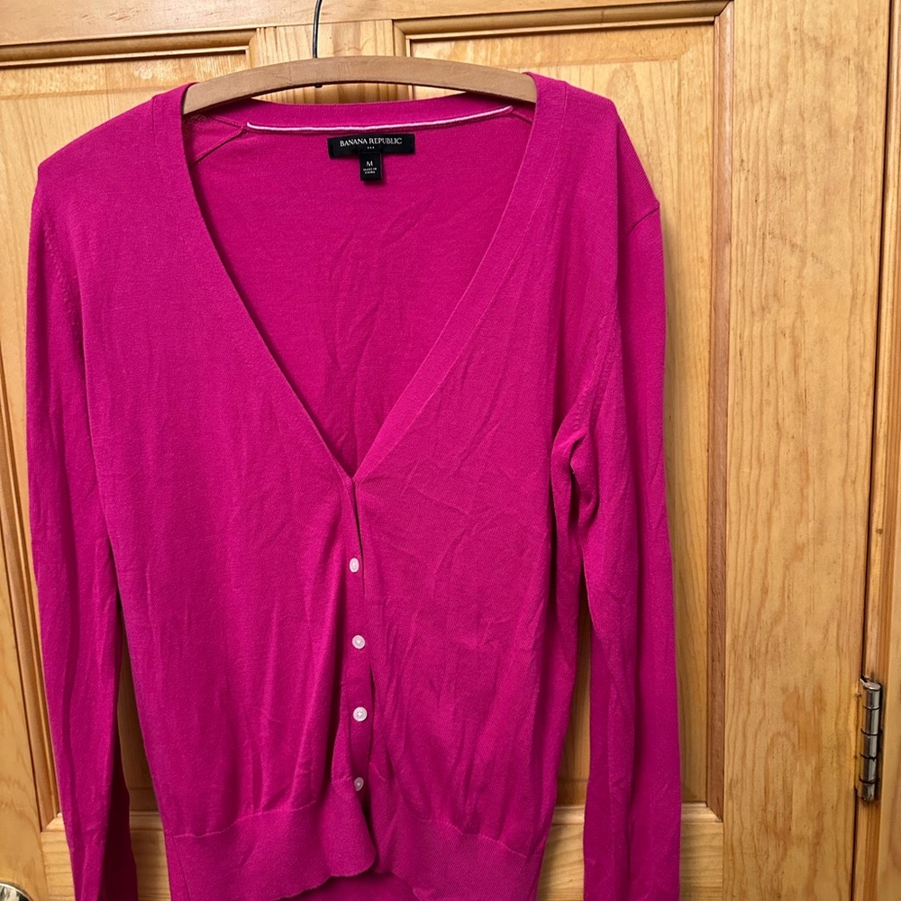 Love these light sweaters. Hot pink or black?